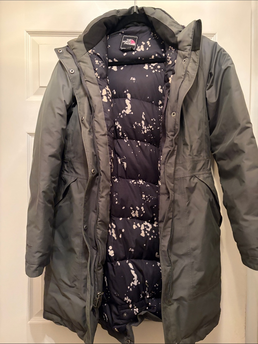 The North Face Women's Olive Green Puffer Jacket with Black Printed Lining